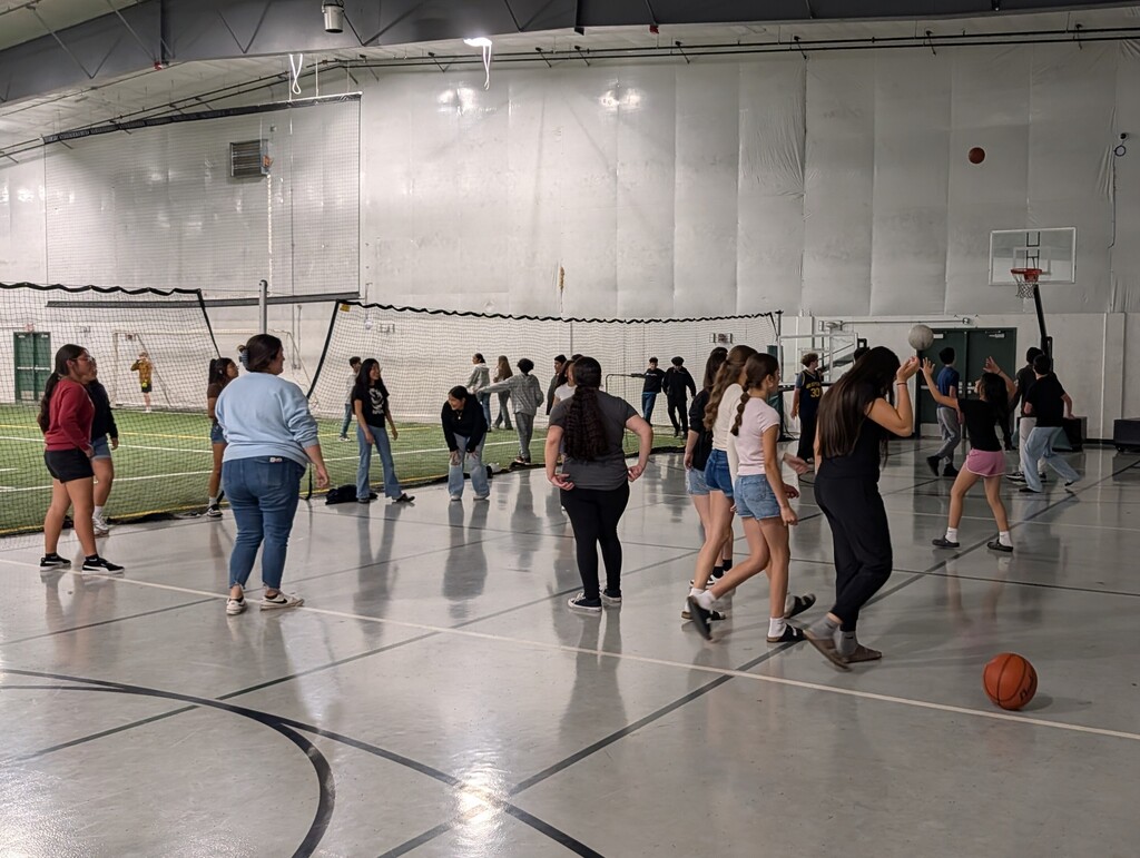 Students in Field House celebrating MAPS incentive.