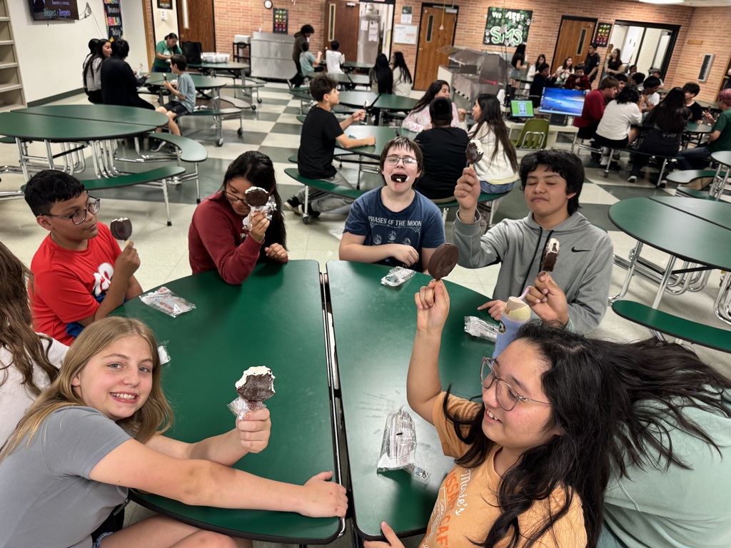Students eating ice cream to celebrate MAPS incentive.