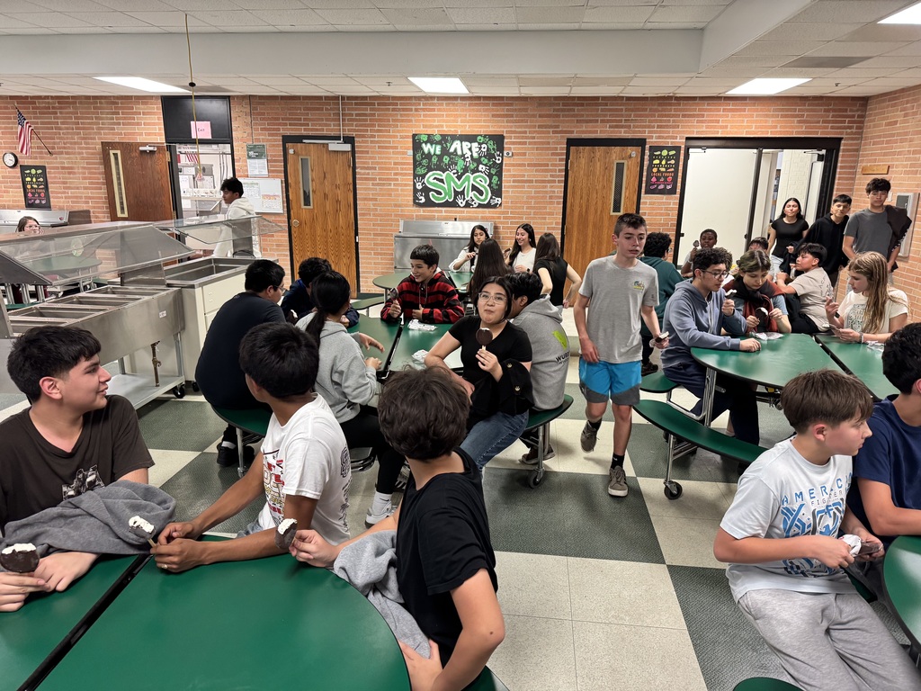Students eating ice cream to celebrate MAPS incentive.