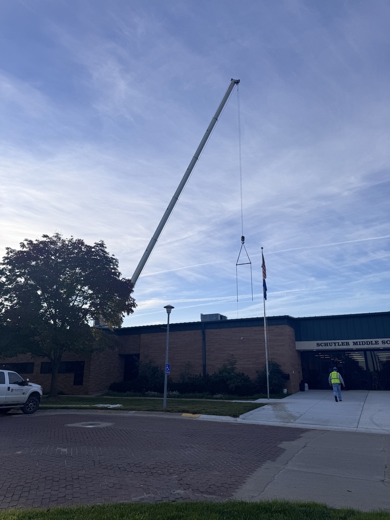 the crane working on hvac units