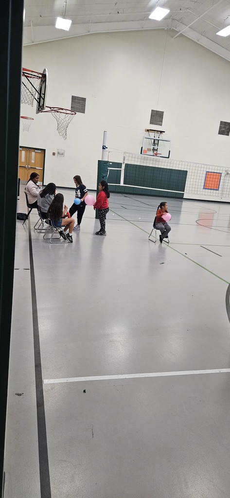 getting balloons ready for balloon volleyball