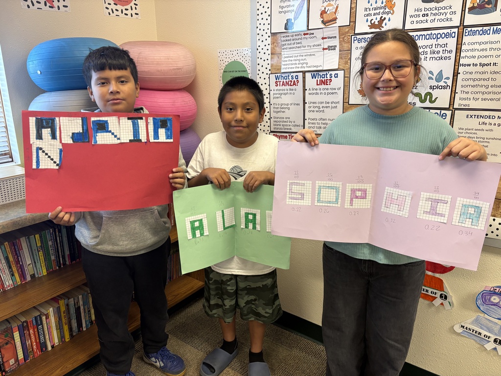Miss Keller's  4th graders are learning how to change fractions to decimals! 🔢 Students were able to find the fraction of their shaded letters and then convert it into a decimal. They wanted to show off their hard work! 🎉