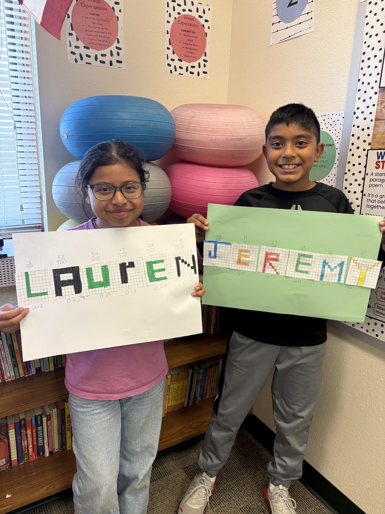 Miss Keller's  4th graders are learning how to change fractions to decimals! 🔢 Students were able to find the fraction of their shaded letters and then convert it into a decimal. They wanted to show off their hard work! 🎉