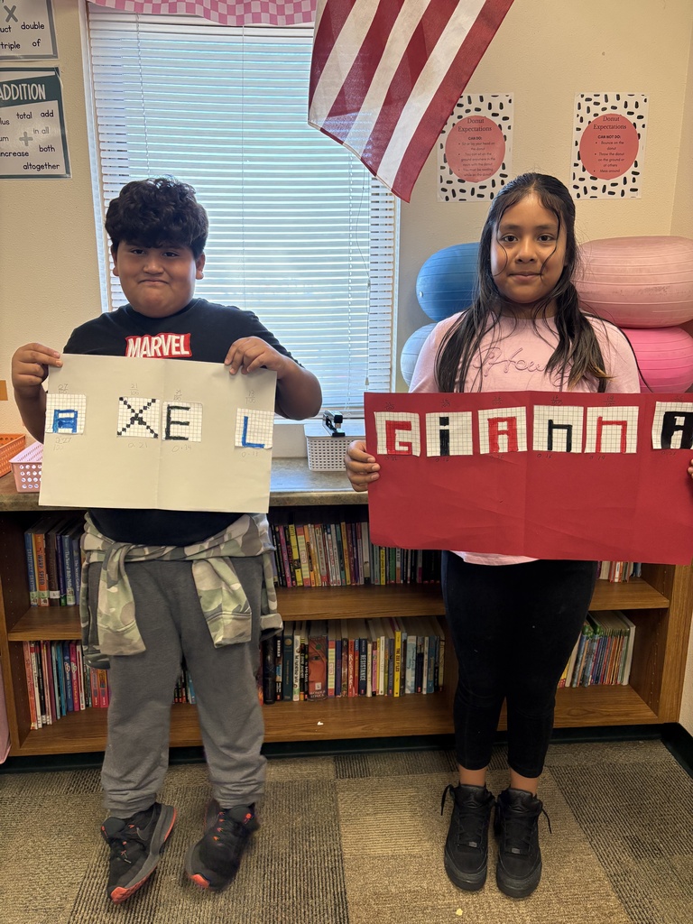 Miss Keller's  4th graders are learning how to change fractions to decimals! 🔢 Students were able to find the fraction of their shaded letters and then convert it into a decimal. They wanted to show off their hard work! 🎉
