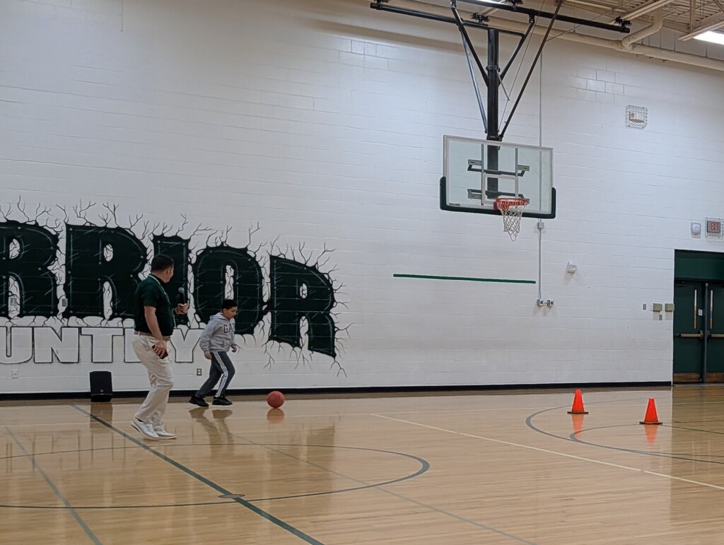 Student participating in the obstacle course.