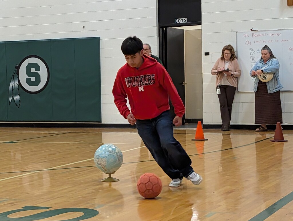 Student participating in the obstacle course.