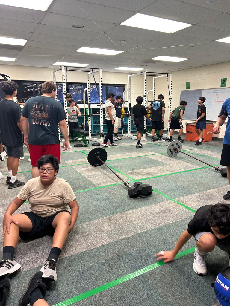 Boys wrestling making good use of our SMS weight room.