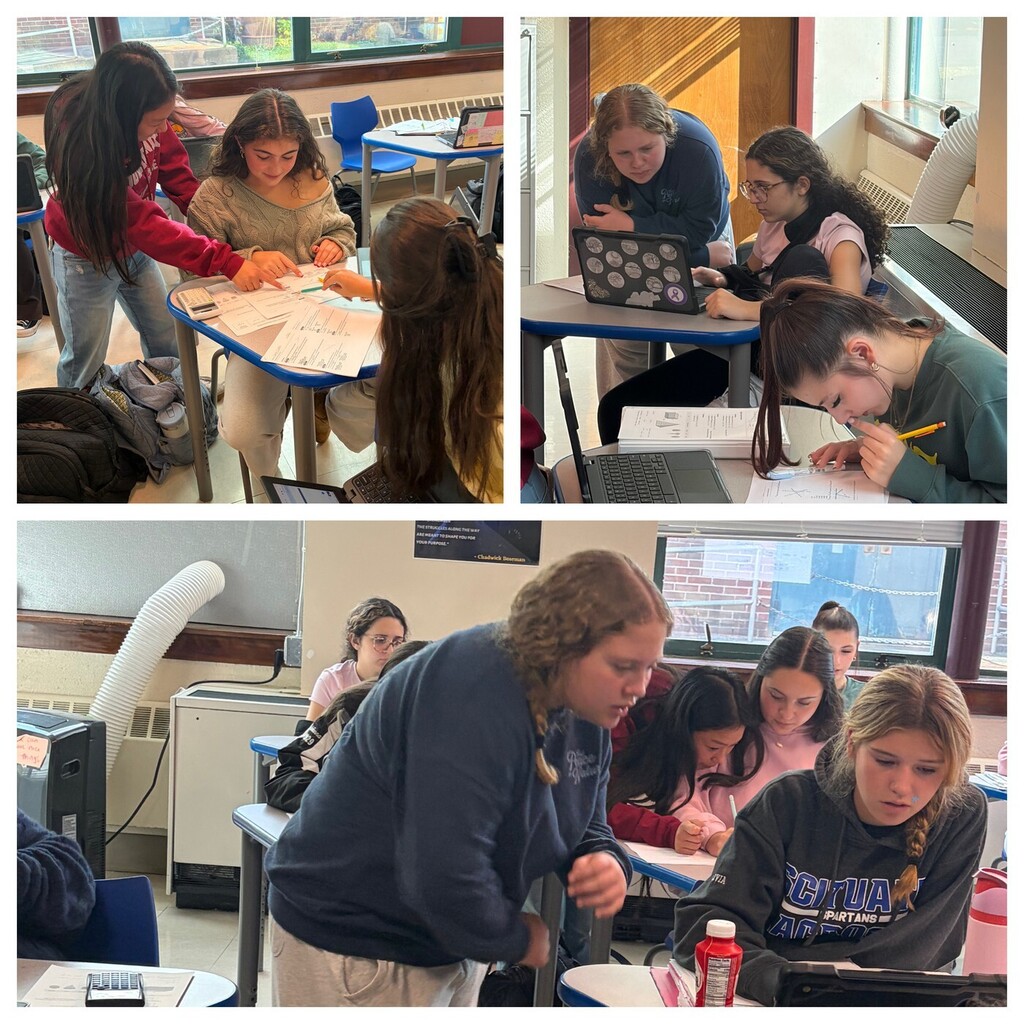 SHS math lab students working together on classwork.