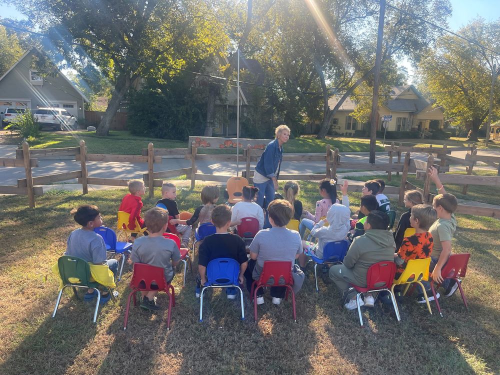 students listening to pumpkin story