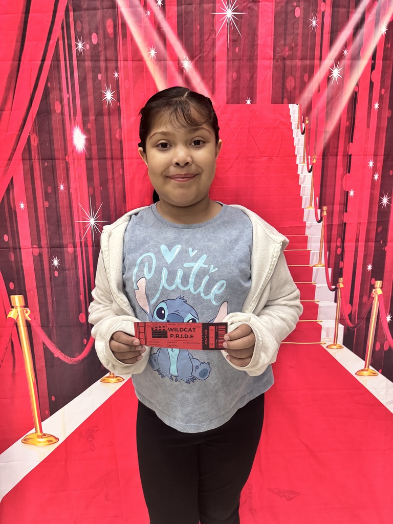 Smiling child on red background