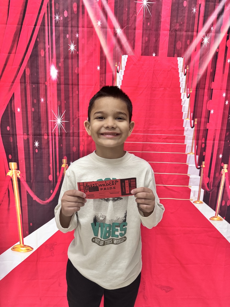 Smiling child on red background