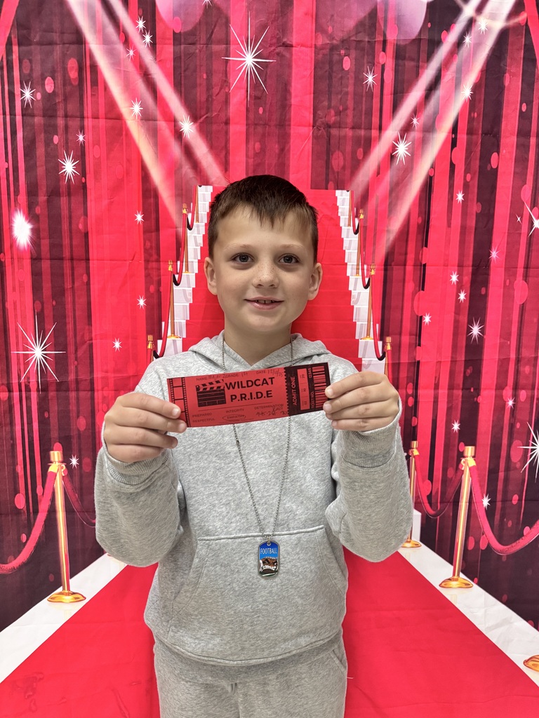 Smiling child on red background