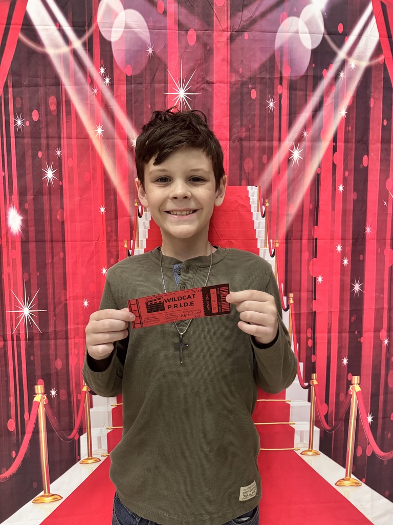 Smiling child on red background