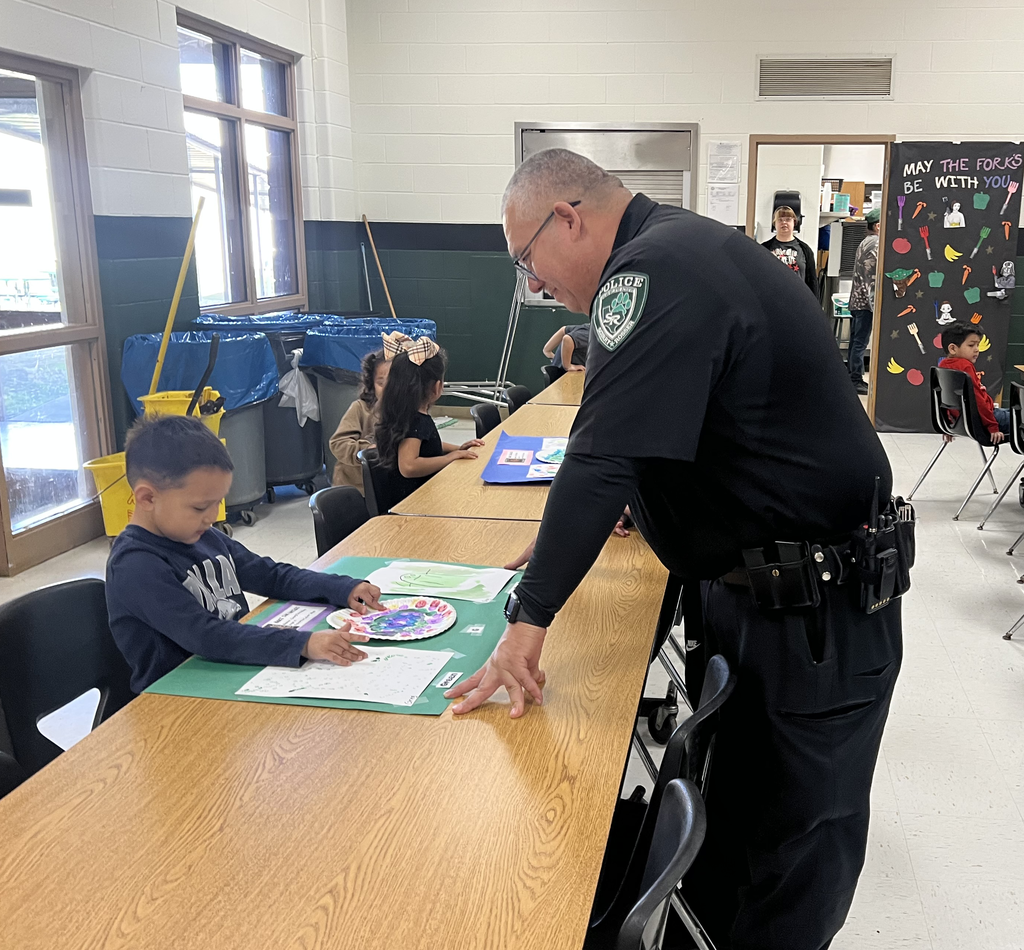 student answering question for adult