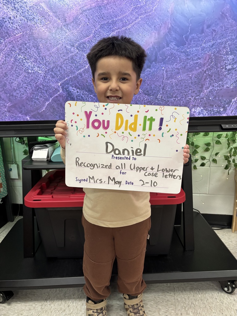 child holding celebration board