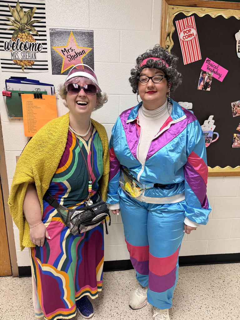 two white females dresses an elderly women