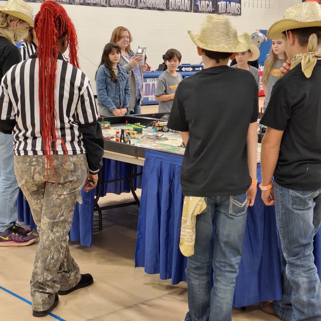 Students watching the legos