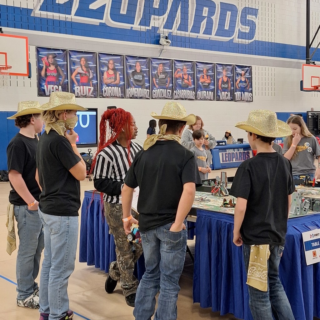 Students in front of  a robotic table