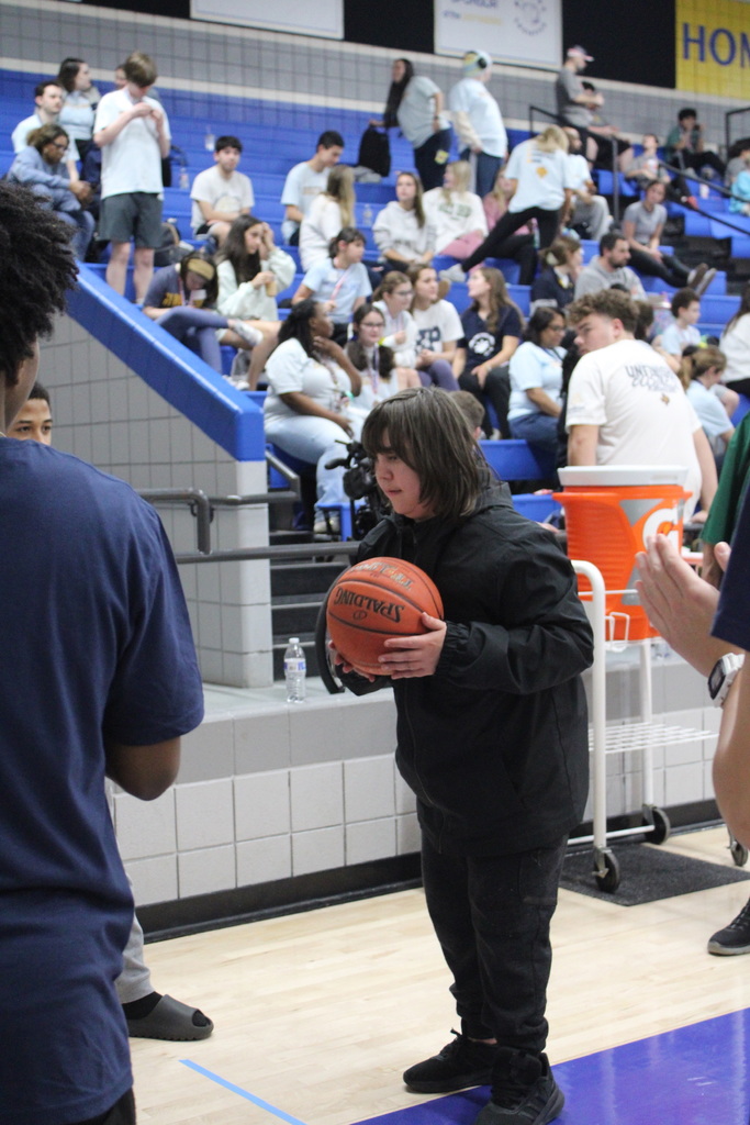 Student holding  a basketball
