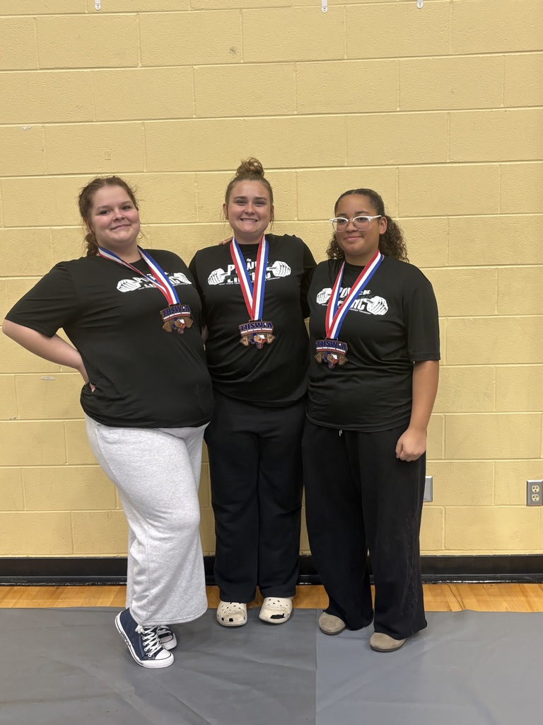 three teenager girls dressed in black tshirts