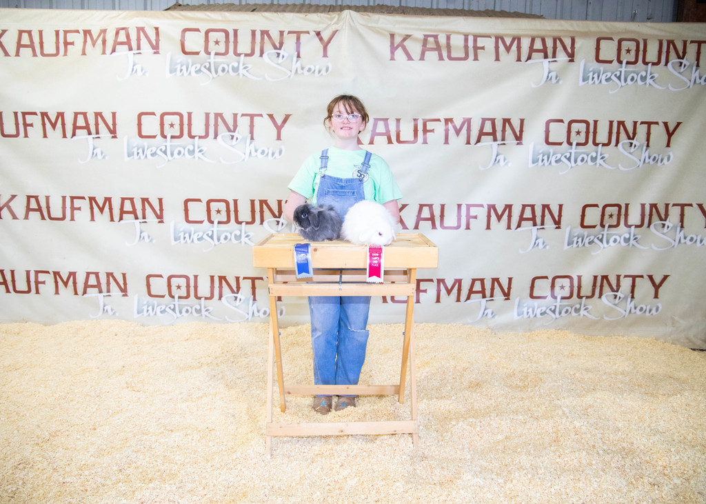 young girl with rabbits