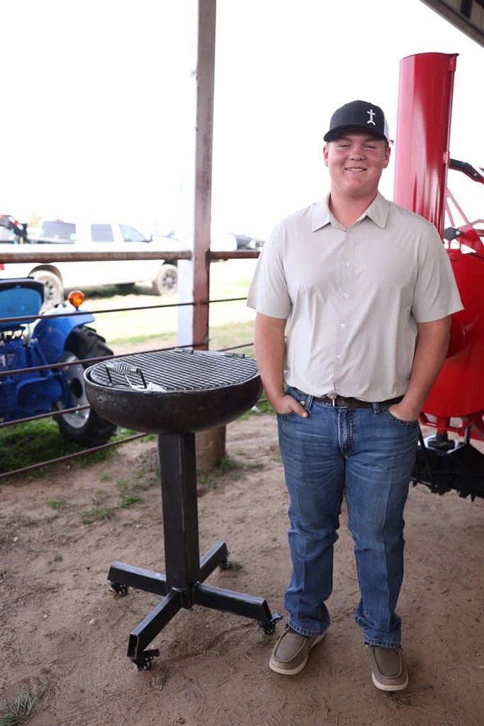 male student and ag mechanics project (grill)