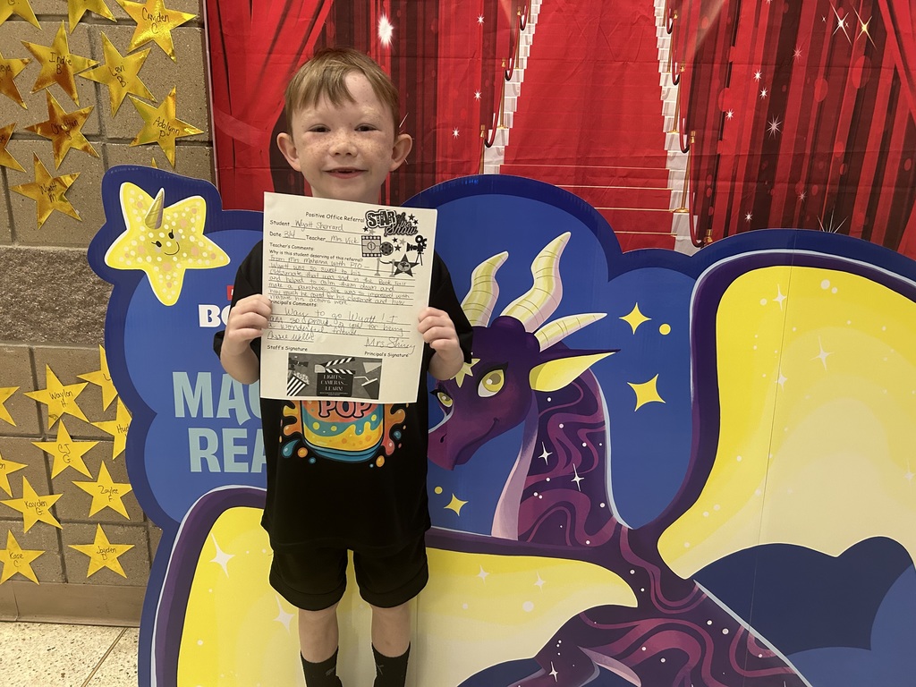 Smiling by holding a positive office referral