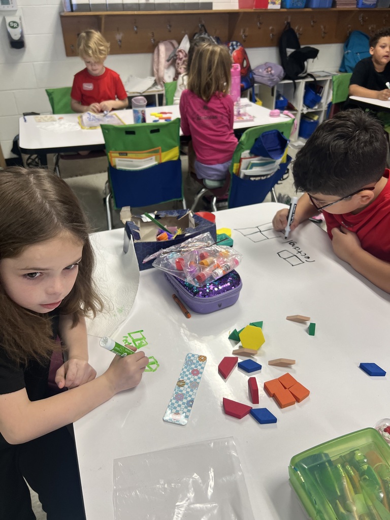 Mrs. Owens' class making composite shapes