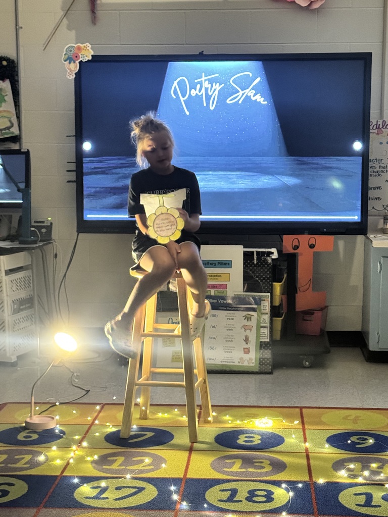 Students showcasing and reading poetry.