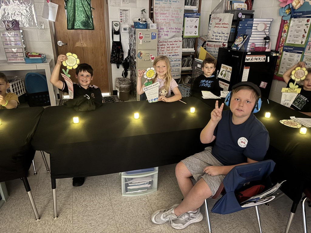 Students showcasing and reading poetry.