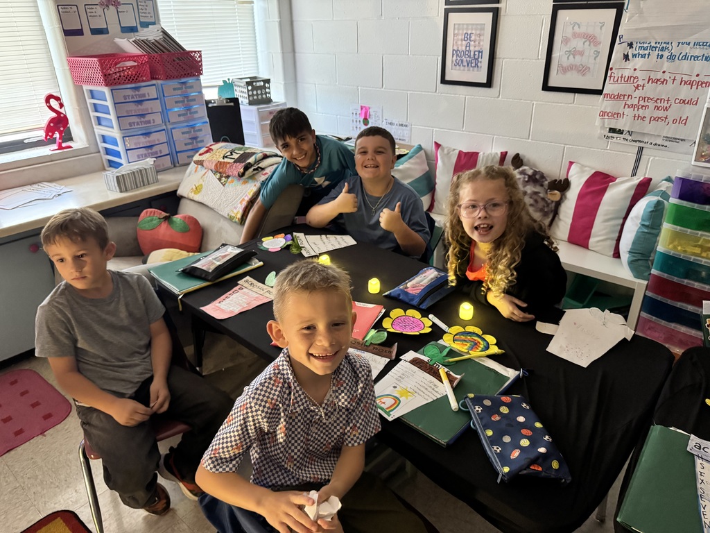 Students showcasing and reading poetry.