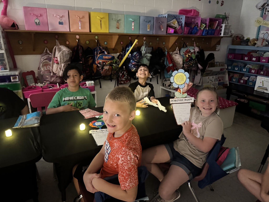 Students showcasing and reading poetry.