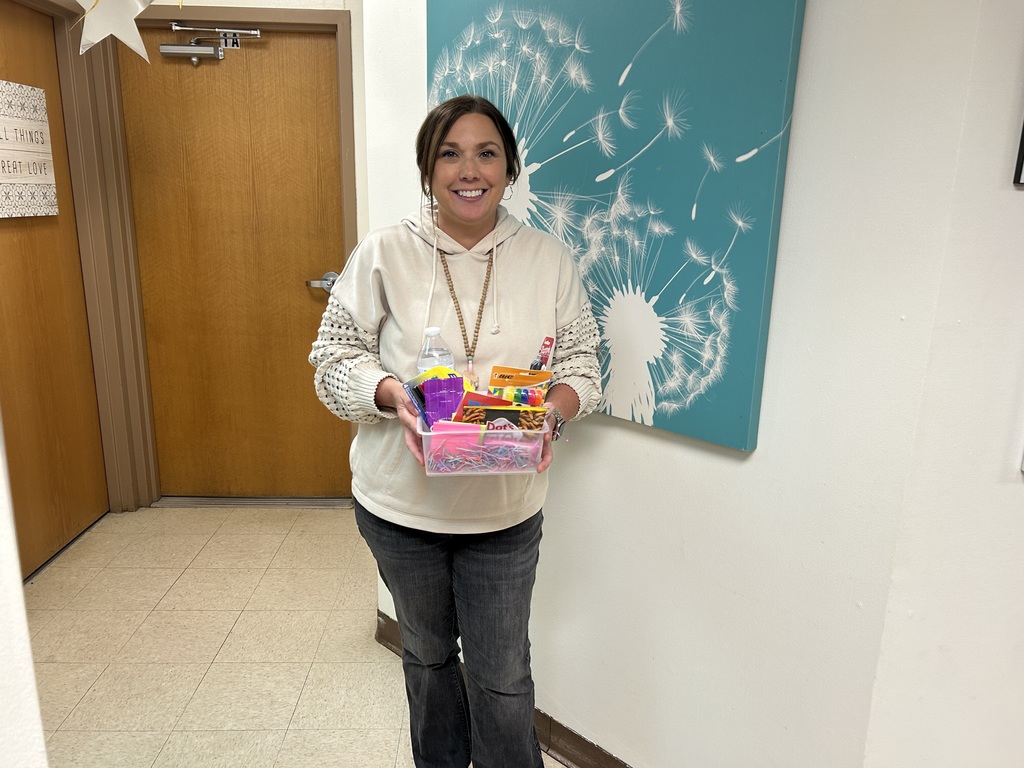 Smiling lady with a basketful of goodies