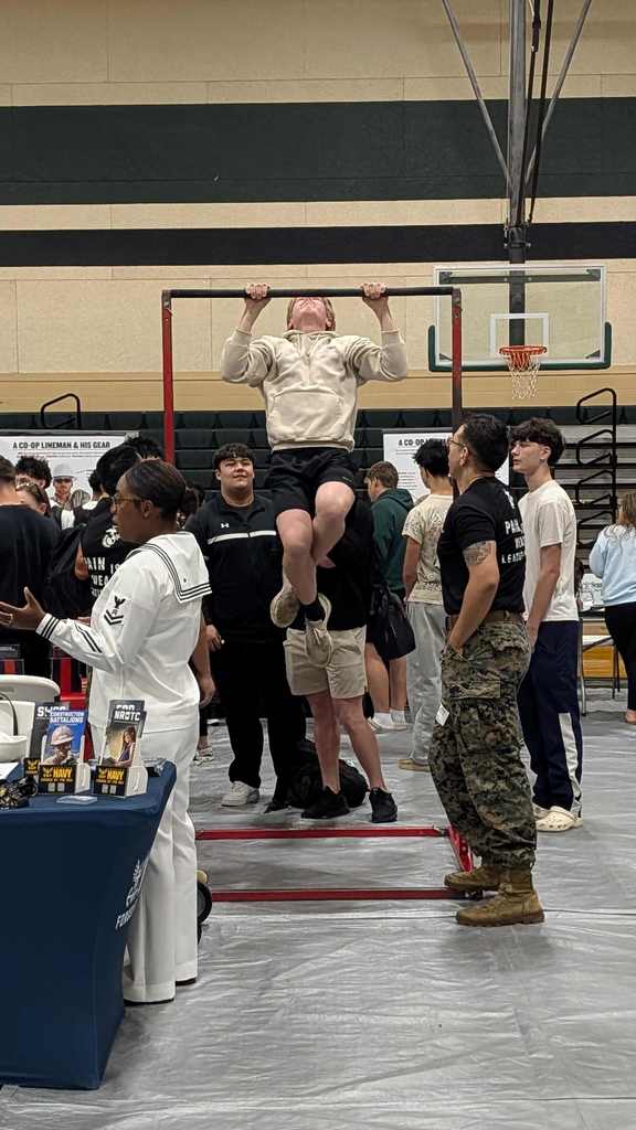 boy demostrating how to do a pull up