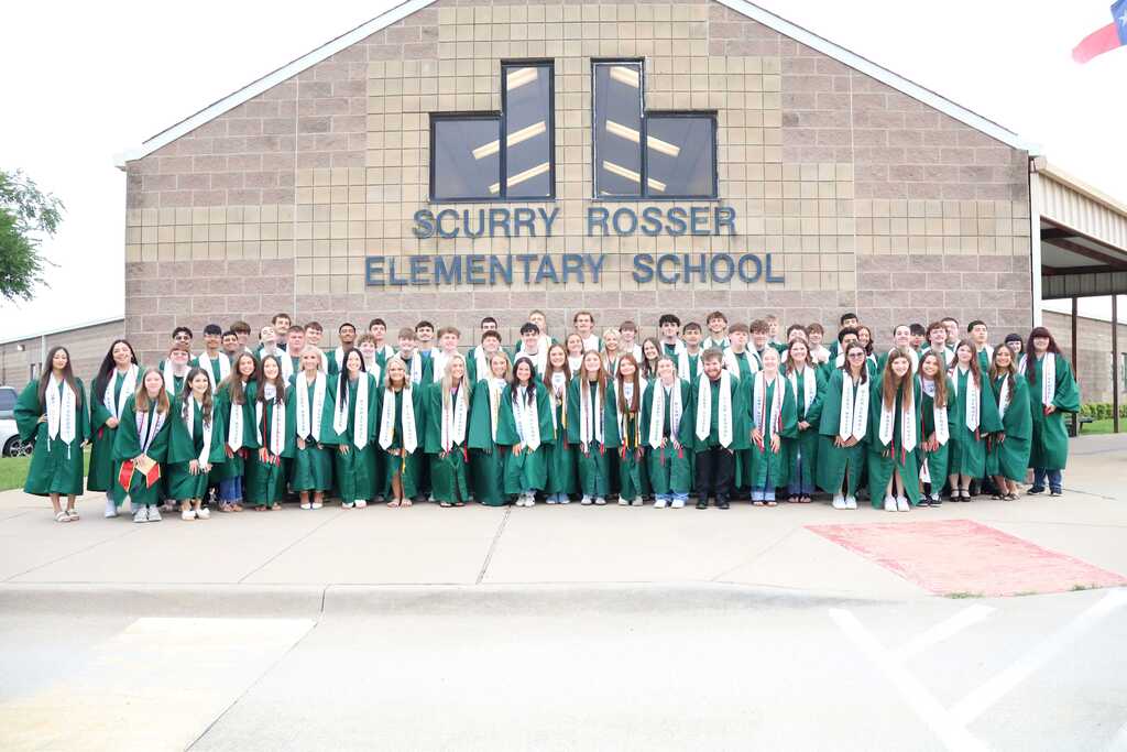 group photo in front of elementary campus