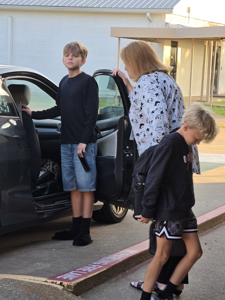 superintendent greeting students