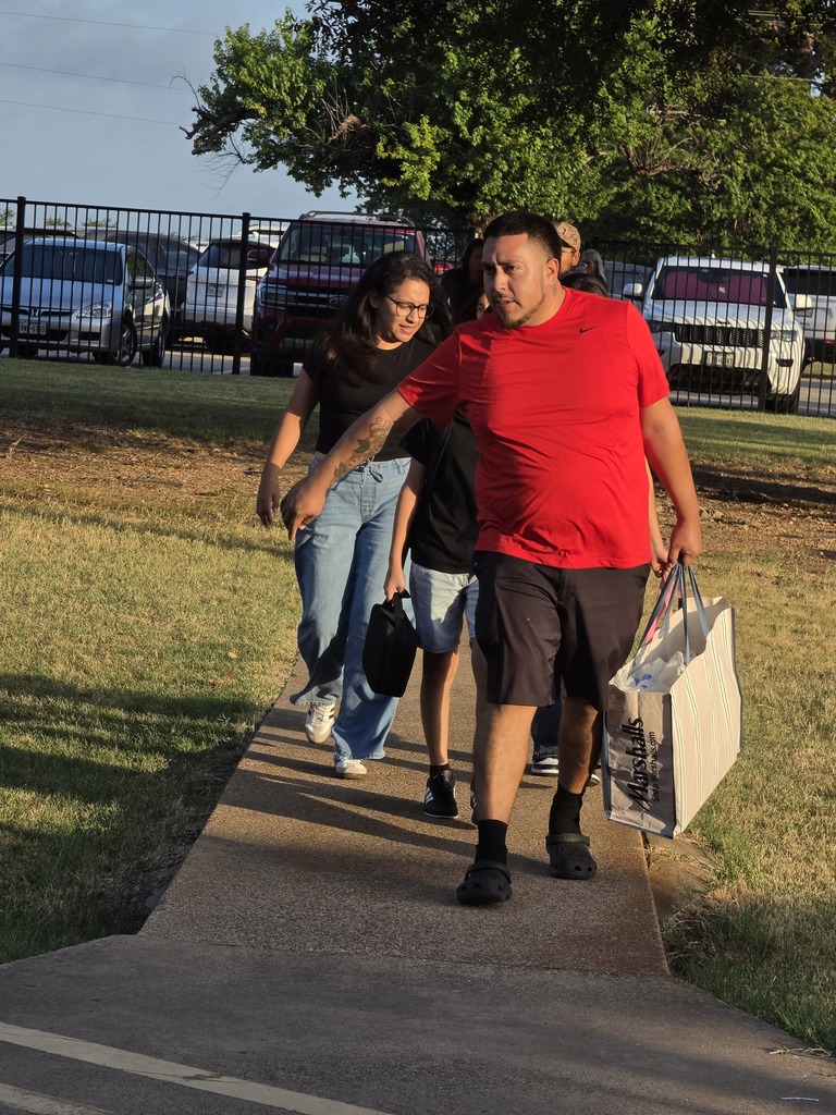 students walking into school