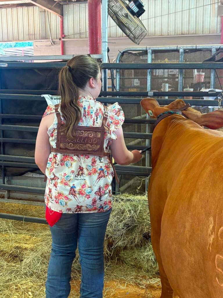 female student and her cow
