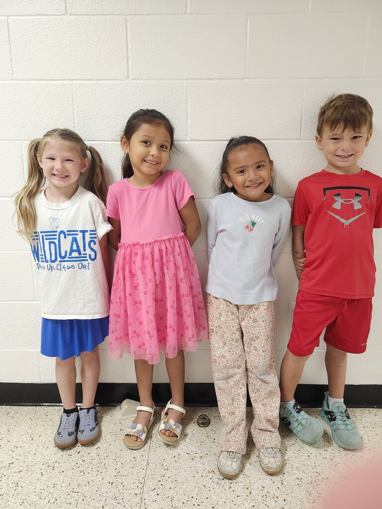 students posing for student of the month