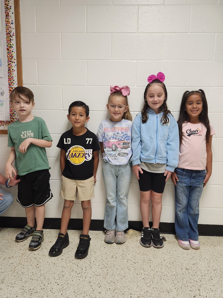students posing for student of the month