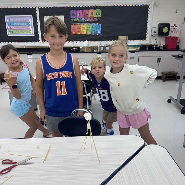 Third grade is up to a challenge, a marshmallow challenge! What team can balance a marshmallow on top of spaghetti?