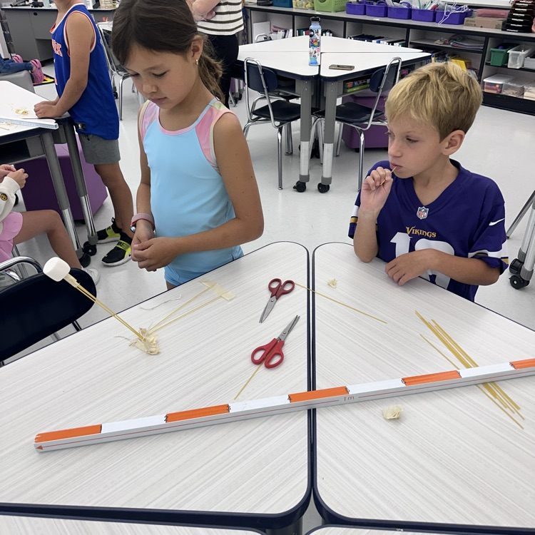 Third grade is up to a challenge, a marshmallow challenge! What team can balance a marshmallow on top of spaghetti?
