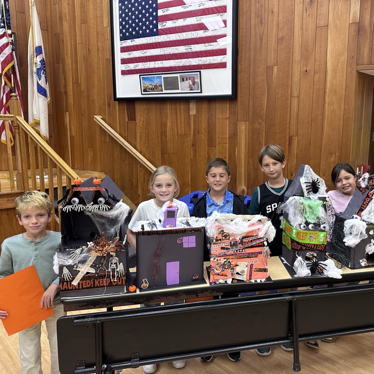 Tales about ghosts, goblins, vampires, oh my! Third graders presented spooky stories and houses at the board of education meeting!