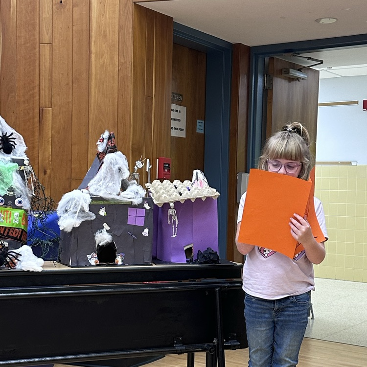 Tales about ghosts, goblins, vampires, oh my! Third graders presented spooky stories and houses at the board of education meeting!