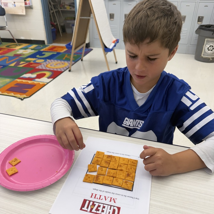How many Cheez-its does it take to cover the area of a shape? Third graders are using cheez its to figure it out!