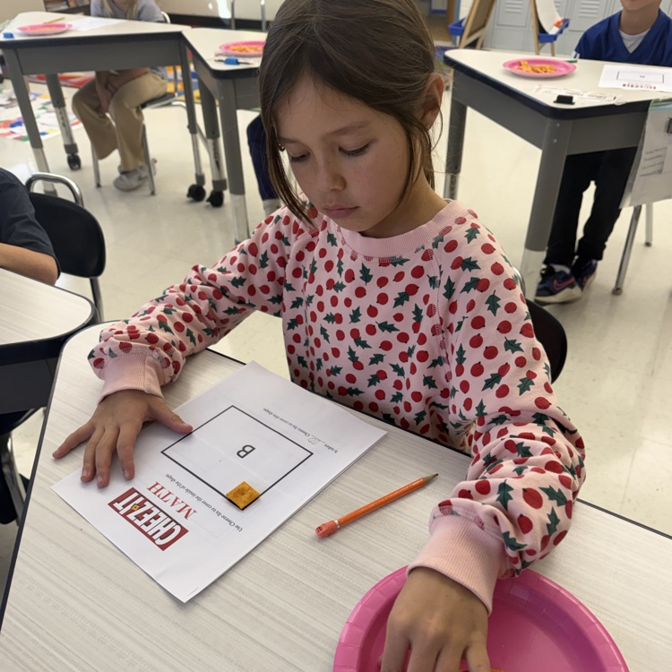 How many Cheez-its does it take to cover the area of a shape? Third graders are using cheez its to figure it out!