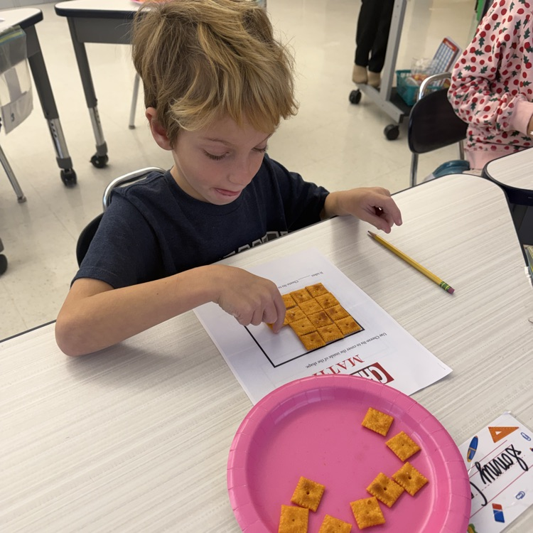 How many Cheez-its does it take to cover the area of a shape? Third graders are using cheez its to figure it out!