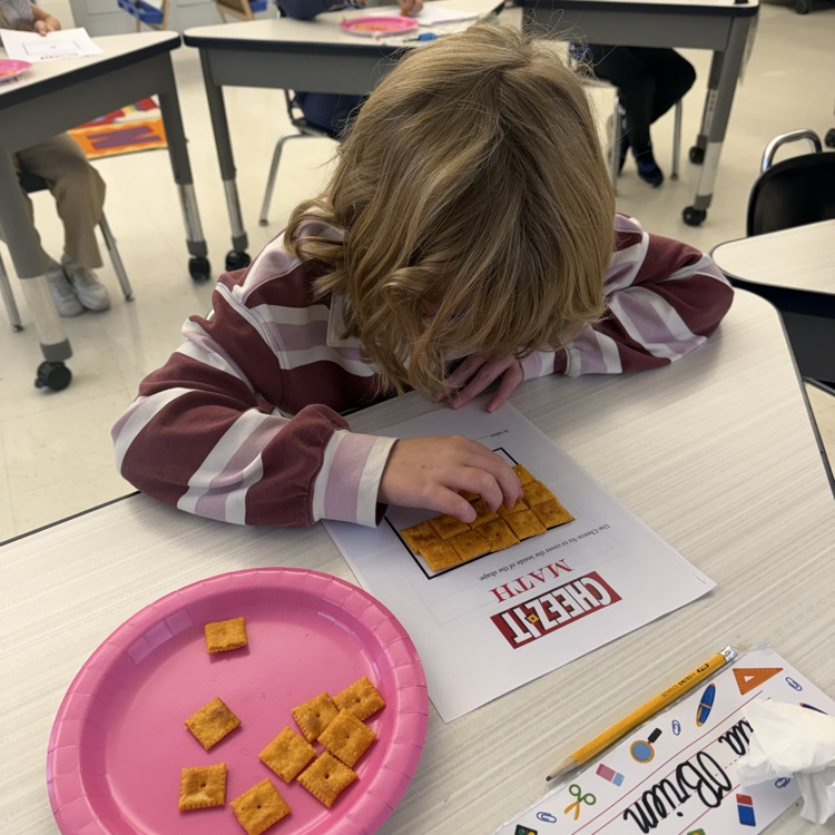 How many Cheez-its does it take to cover the area of a shape? Third graders are using cheez its to figure it out!