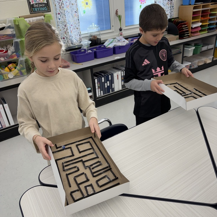 Third graders made marble mazes. Who can get the marble from the start to the finish line?