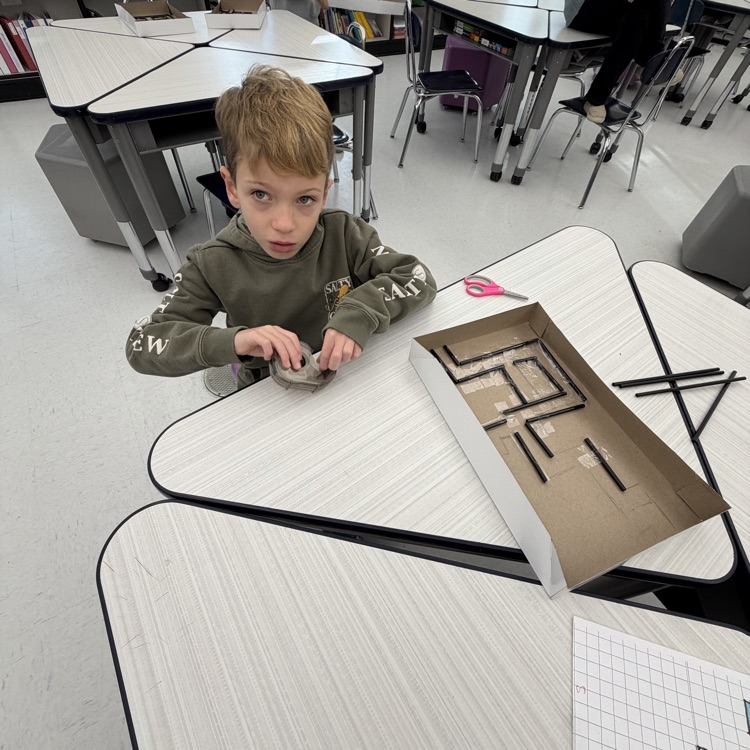 Third graders made marble mazes. Who can get the marble from the start to the finish line?